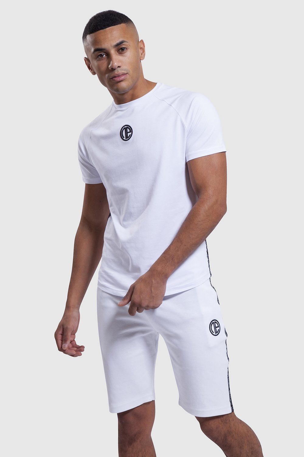 White training top with One Athletic central branding