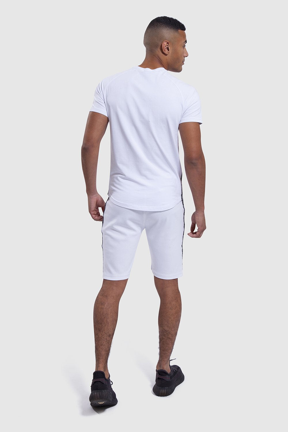back design on white top and gym shorts set